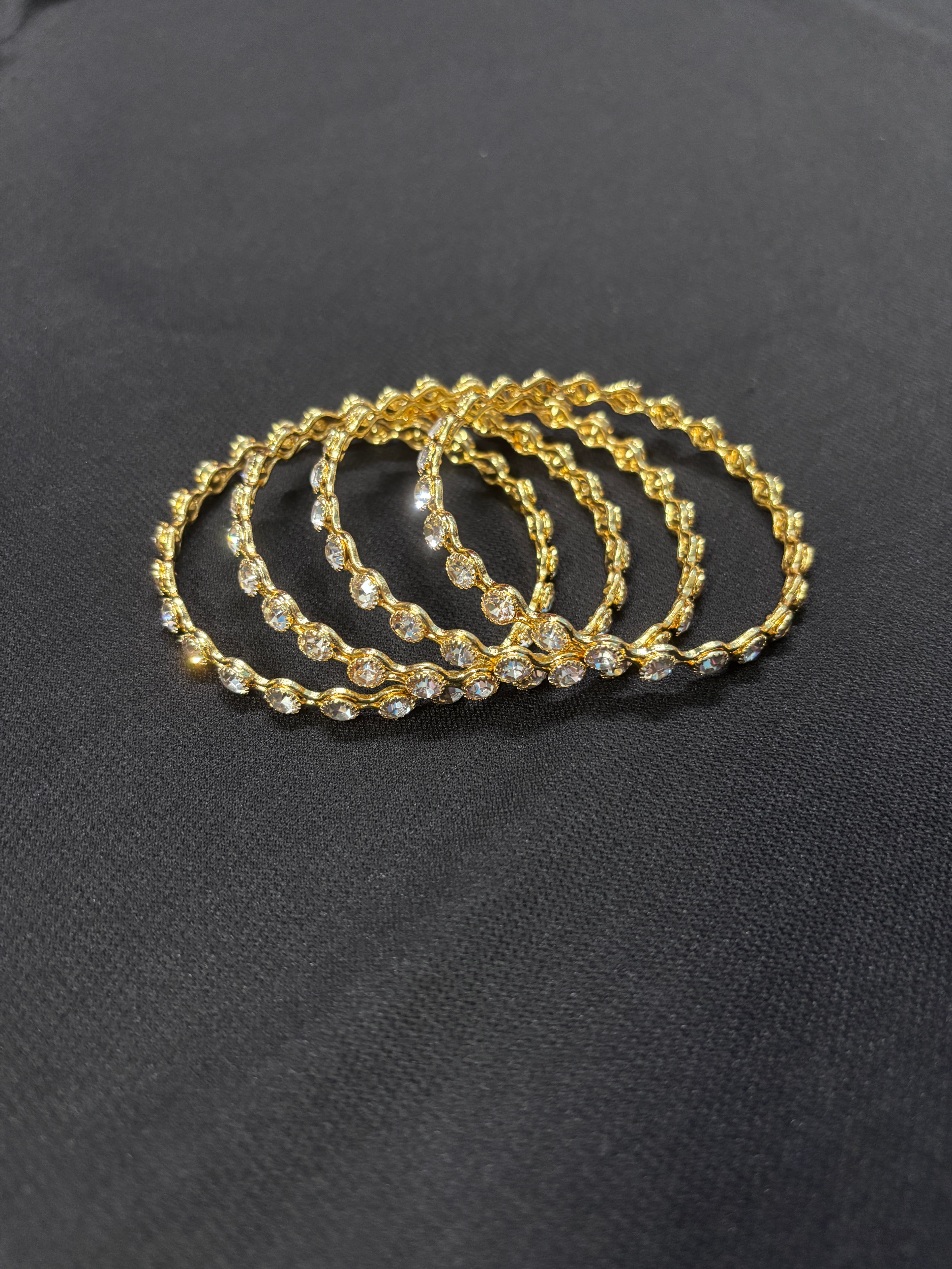 Designer Stone and Metal Gold-Plated Bangle Set in Kolkata